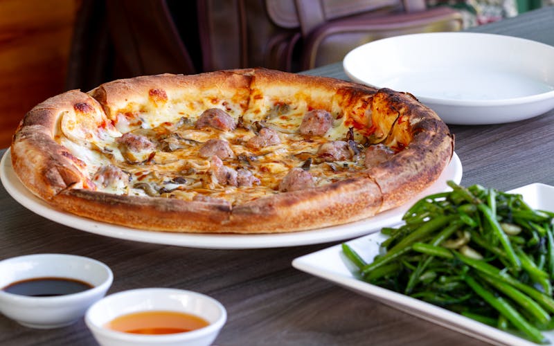 Truffle Mushroom white pizza with arugula