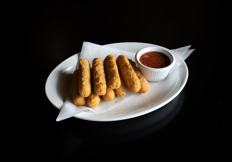 Fried mozzarella sticks with marinara sauce