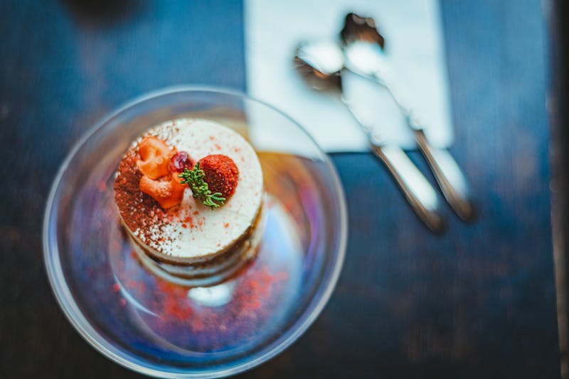 Creamy homemade tiramisu with cocoa dusting