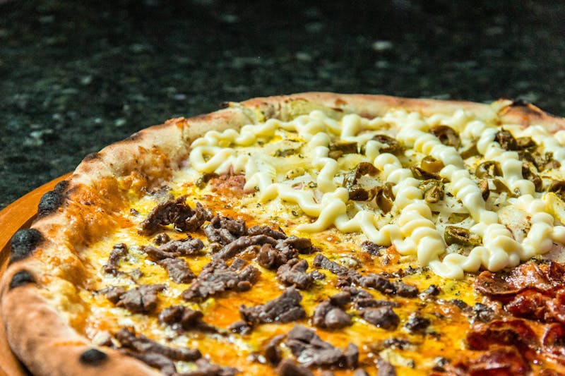 Five-cheese pizza with blended mozzarella and fontina